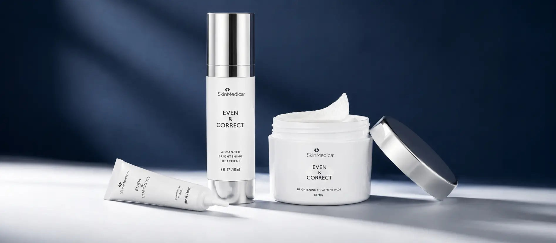 Brightening serum on cream marble with citrus peel — hyperpigmentation